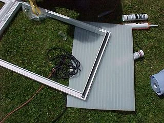 Glazing the Conservatory Roof Vent Adding the glazing to a conservatory roof window vent