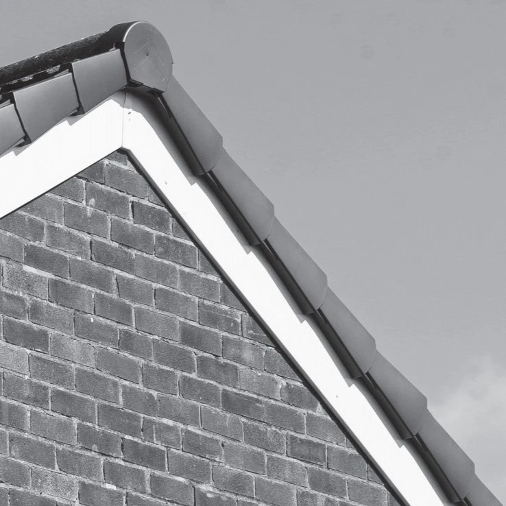 Simple design to overlay the roof tile and provide a hang over down the side to produce a plaesing tidy finish