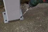 Leveling posts and drilling concrete