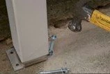 Hammering in fixings and tightening