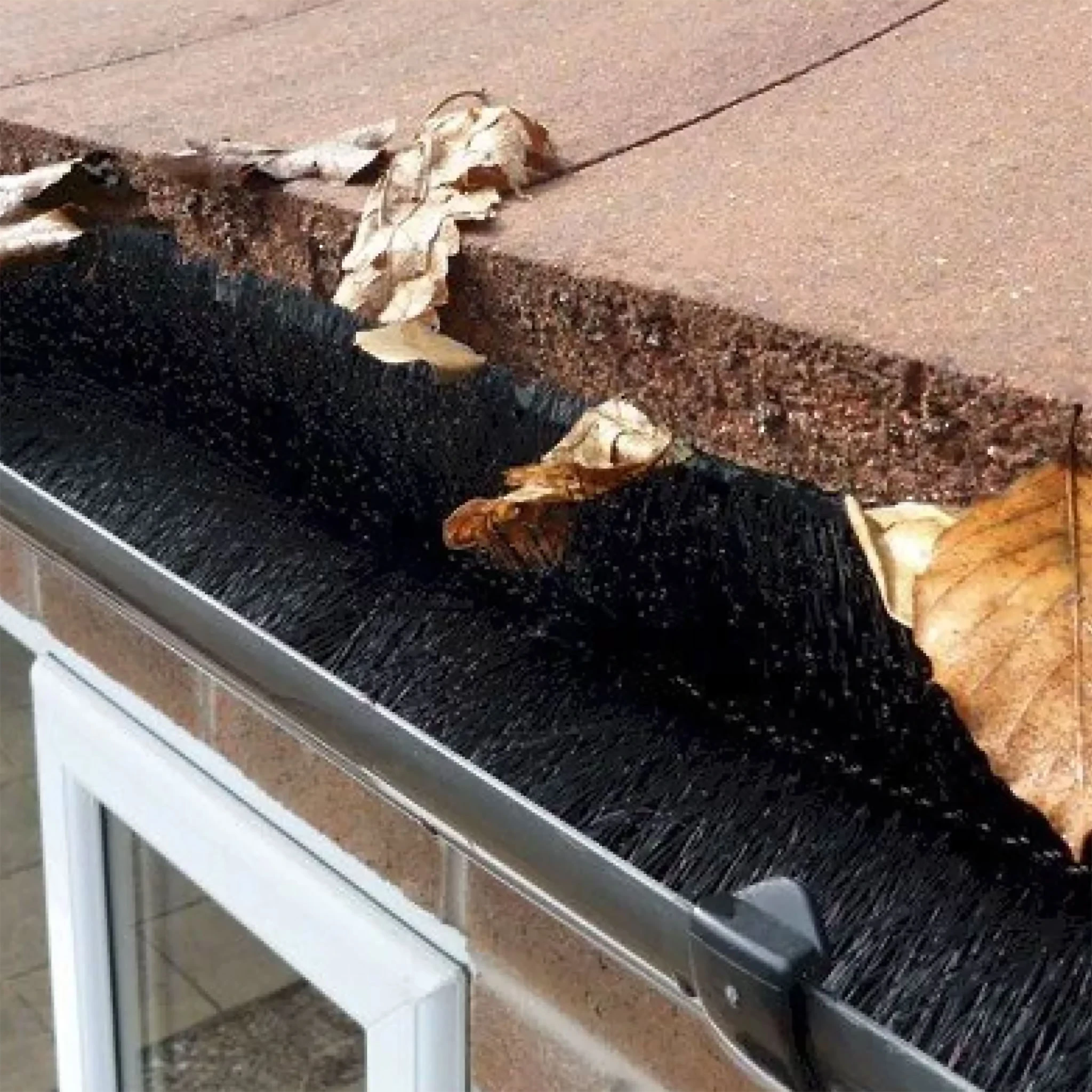 Gutter Hedgehog and Mesh A long length of brush that lies in the gutter to stop leaves